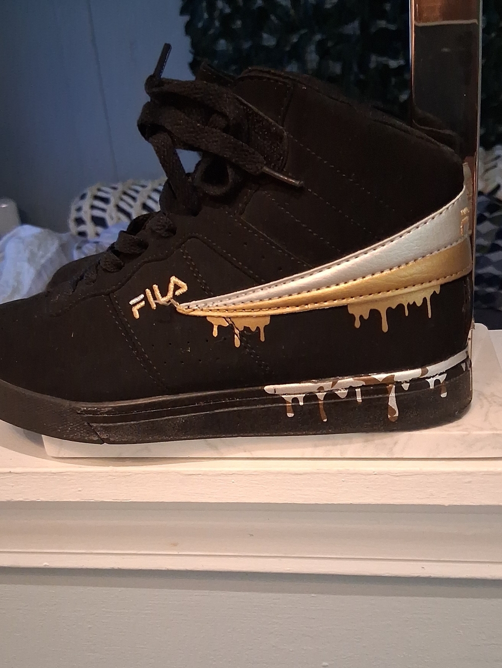 Fila Black High-Top Sneakers with Gold and Silver Drip Detail
